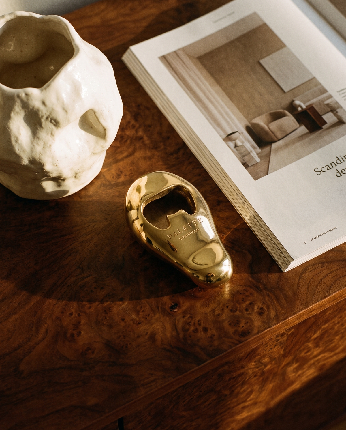 Vincent's Ear bottle opener in polished brass, detail view