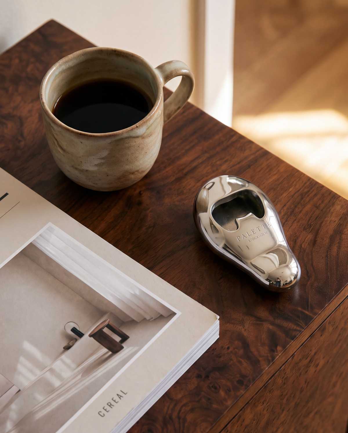Vincent's Ear bottle opener in polished silver, detail view